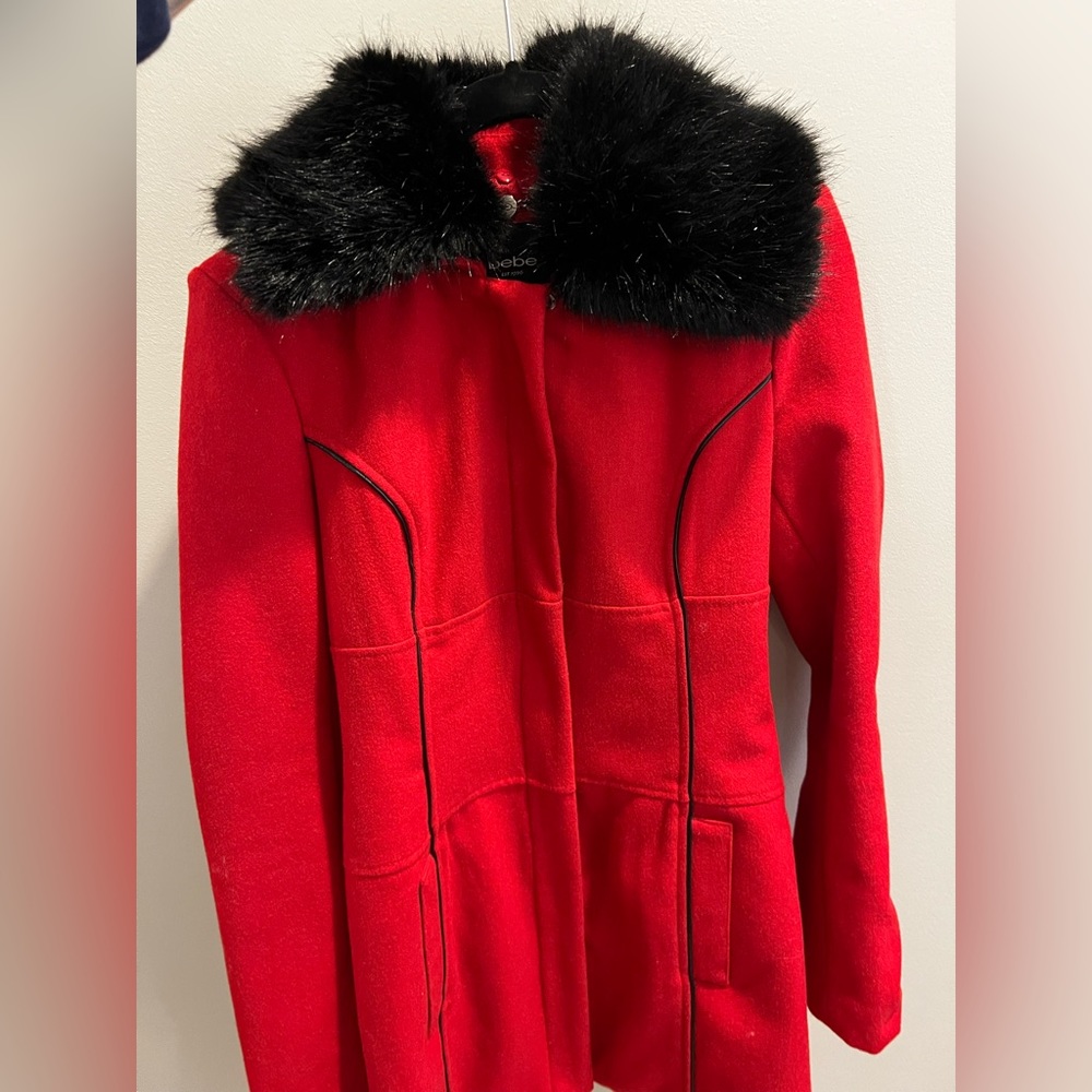 Bebe XS red knee length coat with black fur and leather trim detail